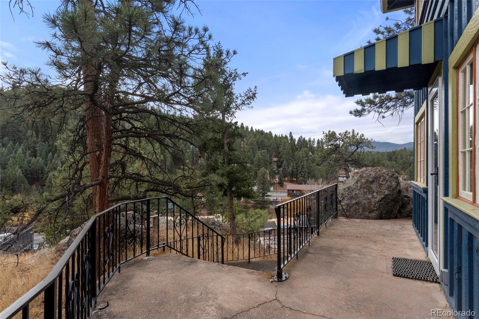 28254 Kinnikinnick Road Evergreen, CO 80439 - Photo 4 of 31 Gallery Image 4