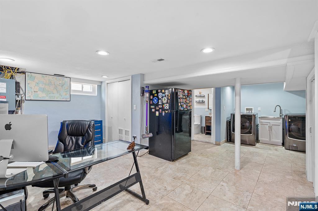 71 Wingra Avenue Rutherford, NJ 07070 - Photo 16 of 20 a view of a livingroom with furniture and window