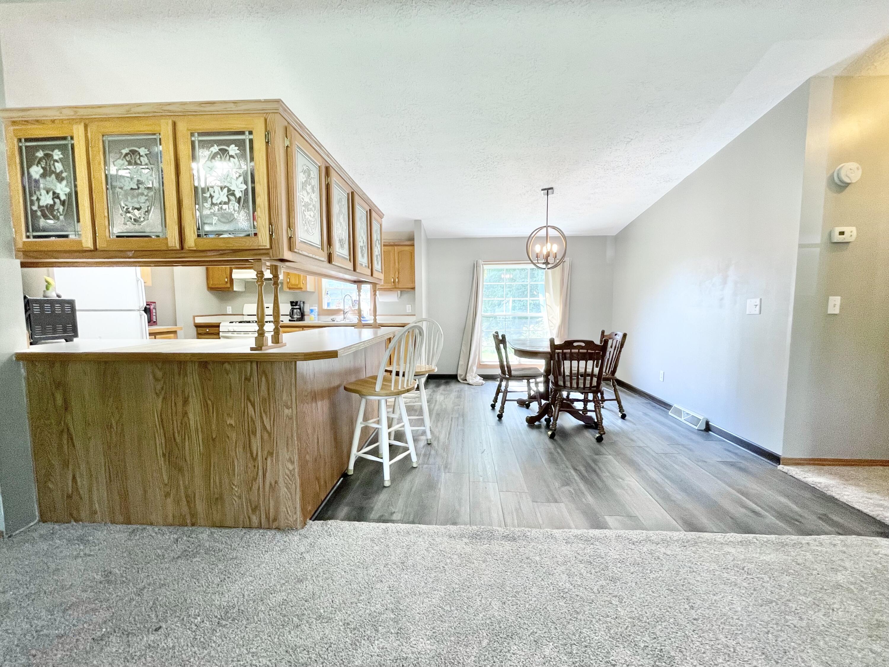 605 East Washington Street Morocco, IN 47963 - Photo 4 of 13 a living room with furniture and wooden floor