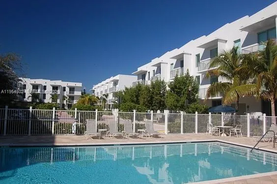a view of a house with a swimming pool