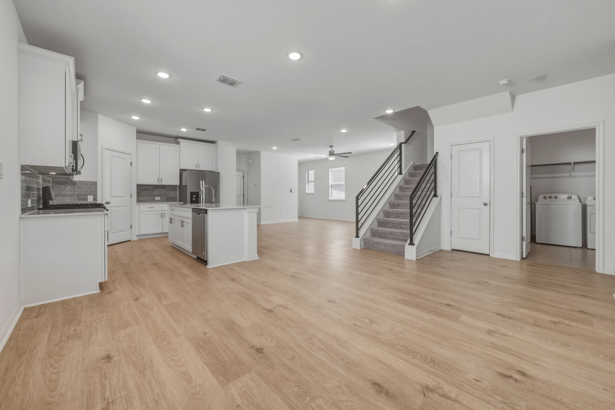 223 Rieber Road Kyle, TX 78640 - Photo 39 of 39 a view of a kitchen with furniture and wooden floor