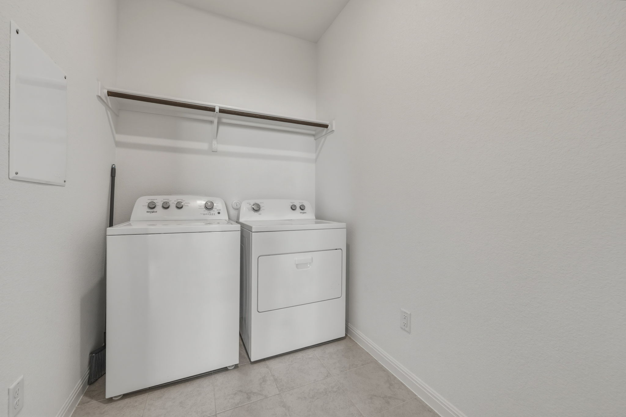 223 Rieber Road Kyle, TX 78640 - Photo 16 of 39 a utility room with dryer and washer