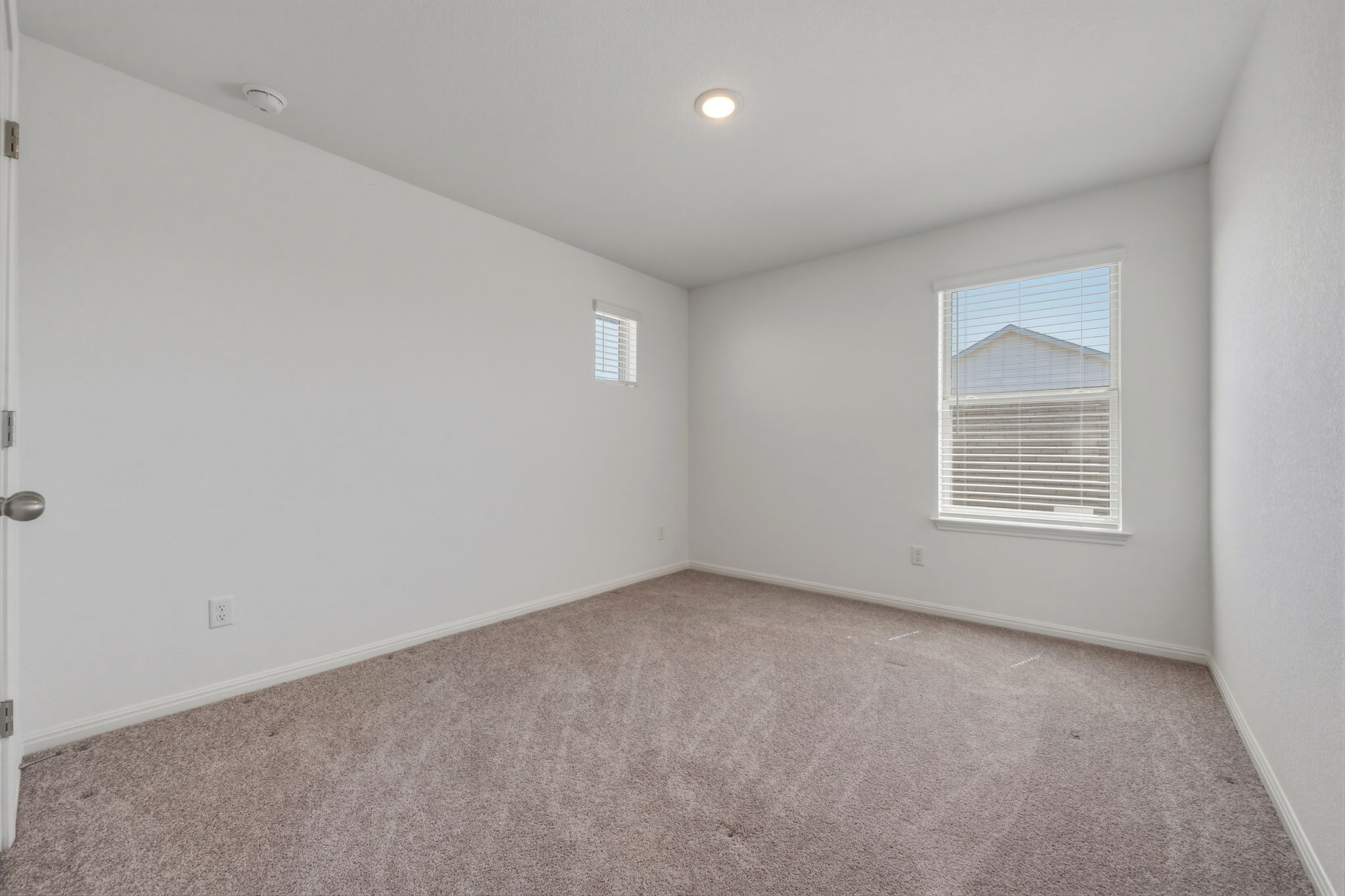 223 Rieber Road Kyle, TX 78640 - Photo 23 of 39 an empty room with a window
