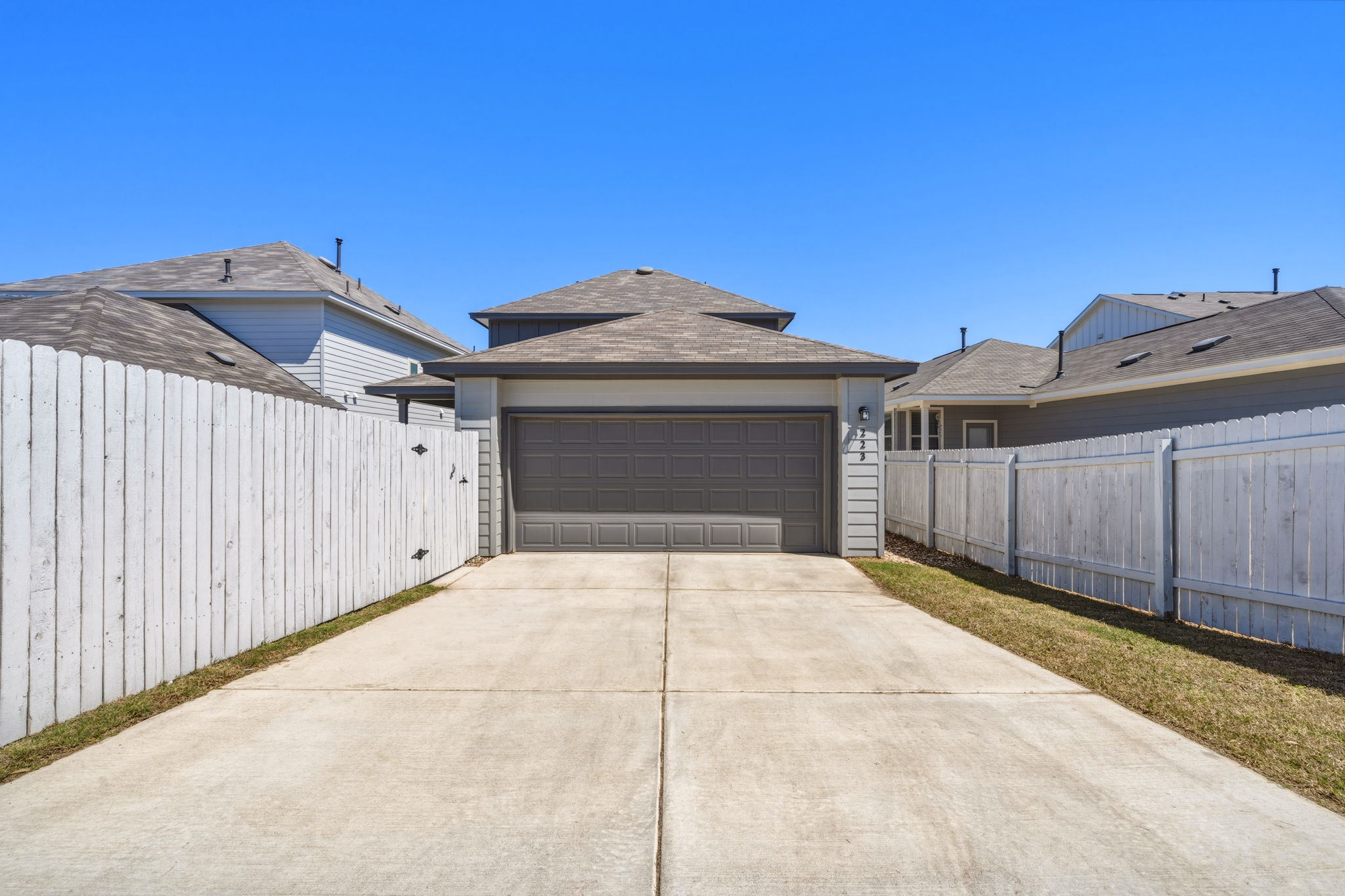 223 Rieber Road Kyle, TX 78640 - Photo 34 of 39 a front view of a house with a garage