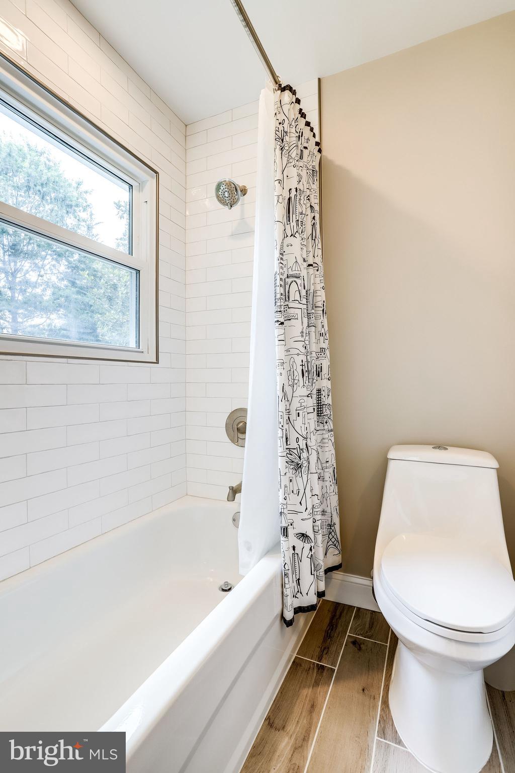 6518 Haystack Road Alexandria, VA 22310 - Photo 18 of 39 Renovated tub shower in full bath