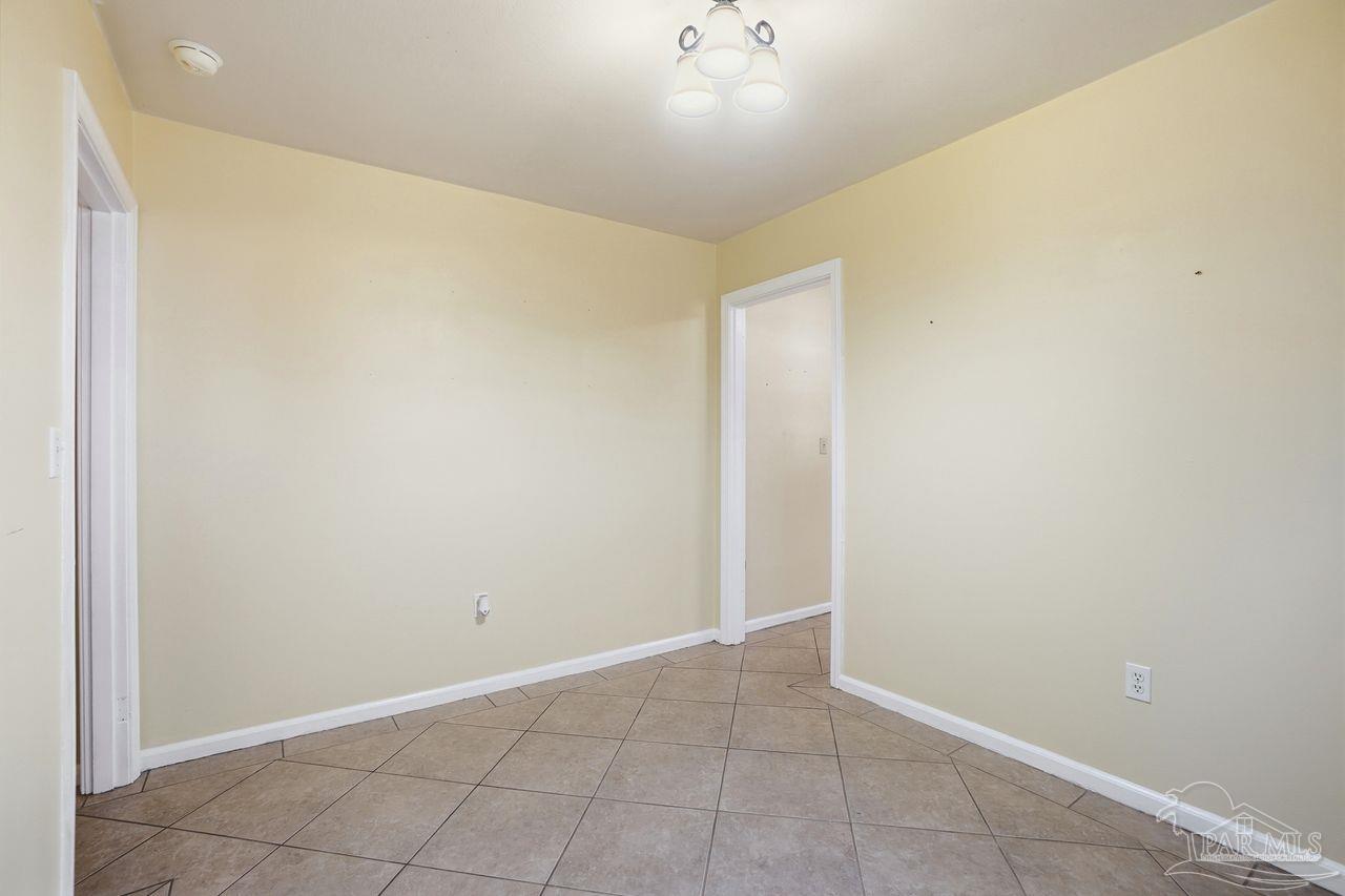 6444 Walnut Street Milton, FL 32570 - Photo 13 of 33 a view of an empty room
