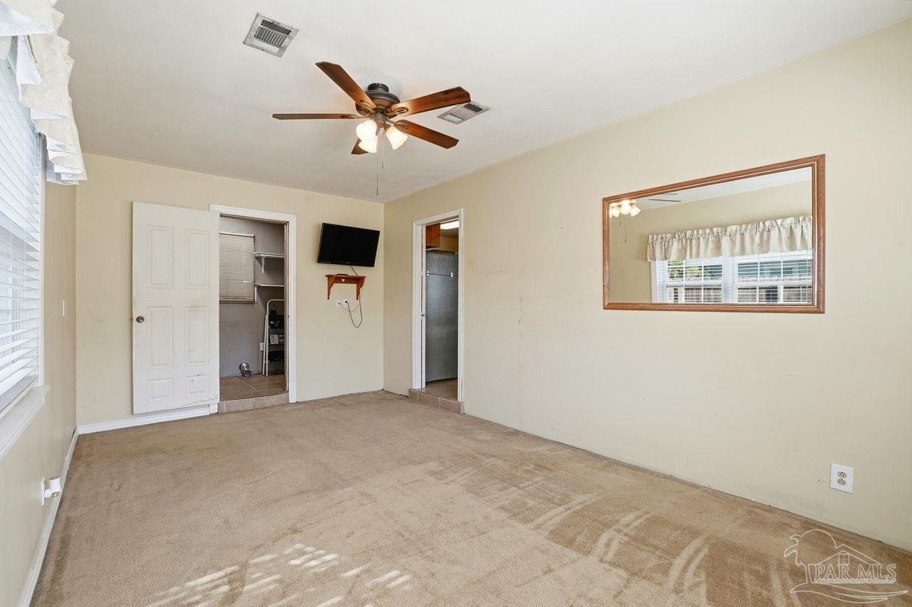 6444 Walnut Street Milton, FL 32570 - Photo 14 of 33 a view of an empty room