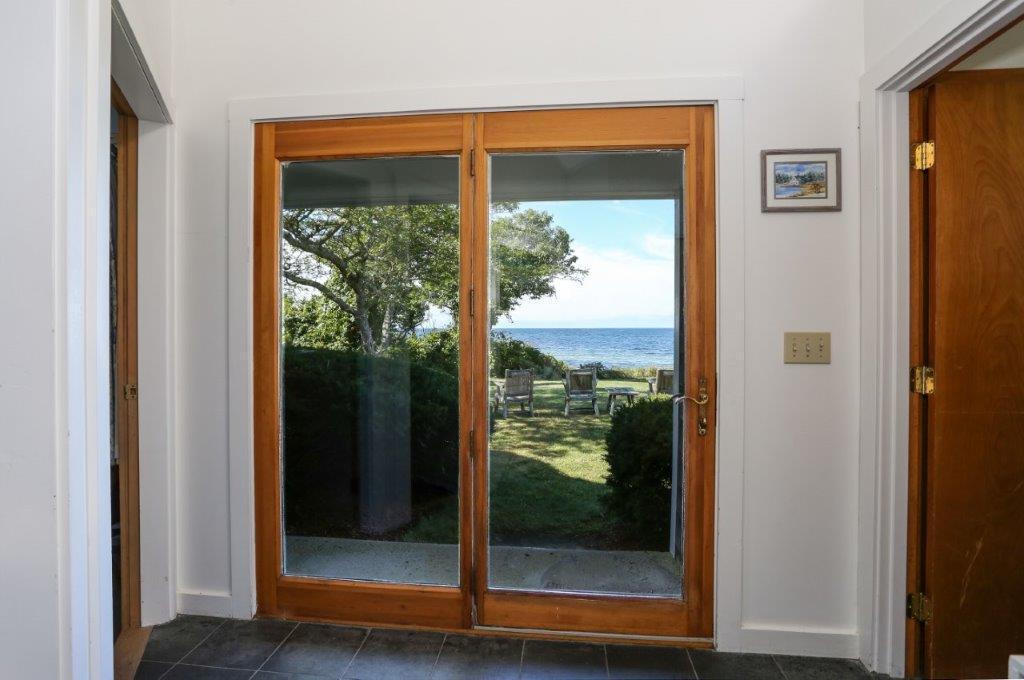 114 Quaker Road Falmouth, MA 02540 - Photo 18 of 35 a view of a glass door and a window
