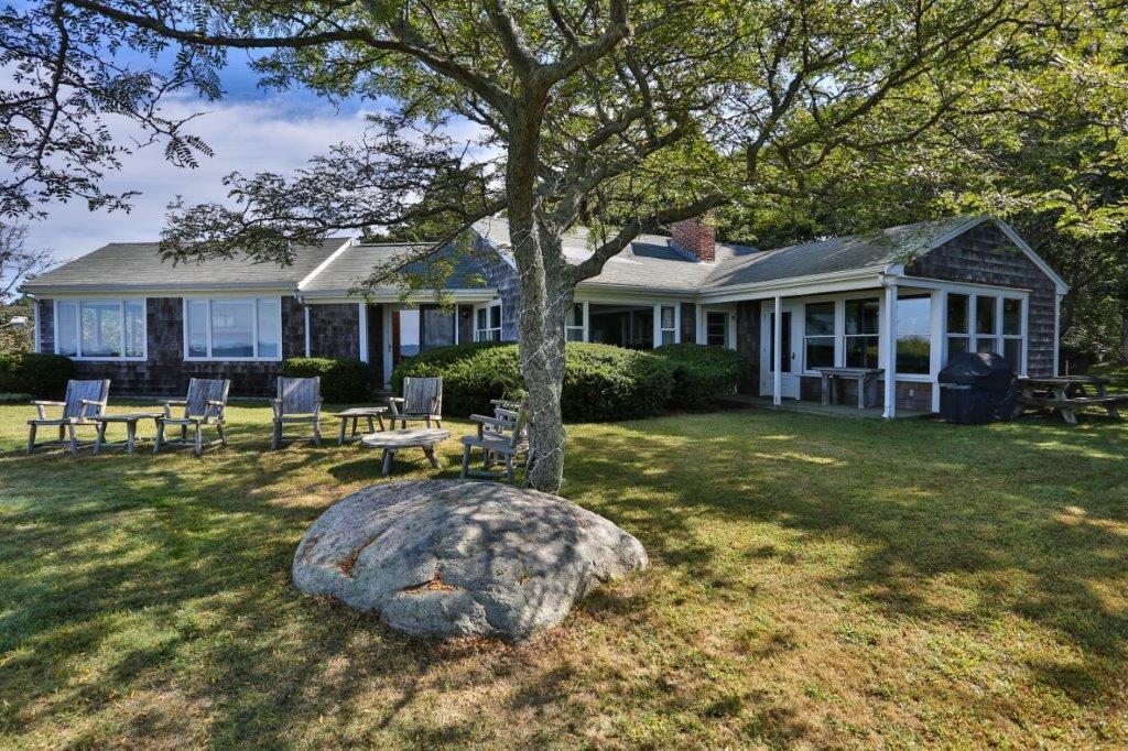 114 Quaker Road Falmouth, MA 02540 - Photo 20 of 35 a front view of a house with garden