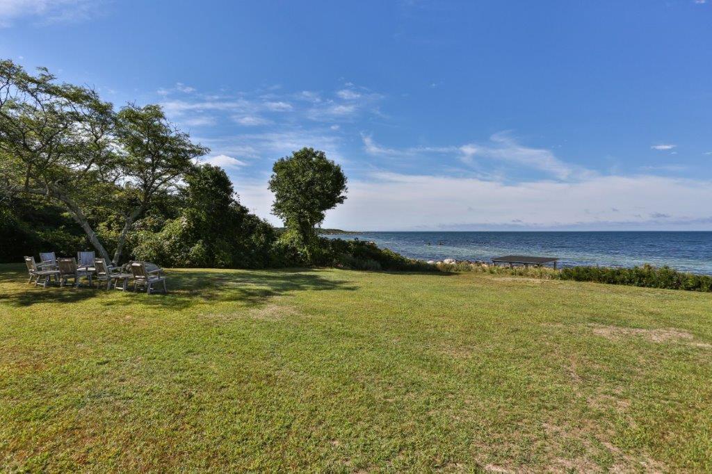 114 Quaker Road Falmouth, MA 02540 - Photo 26 of 35 a view of a swimming pool and an outdoor seating