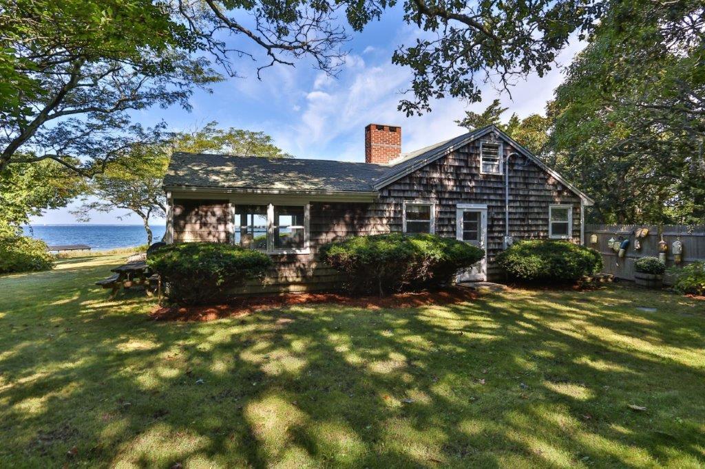 114 Quaker Road Falmouth, MA 02540 - Photo 6 of 35 a view of a house with a yard