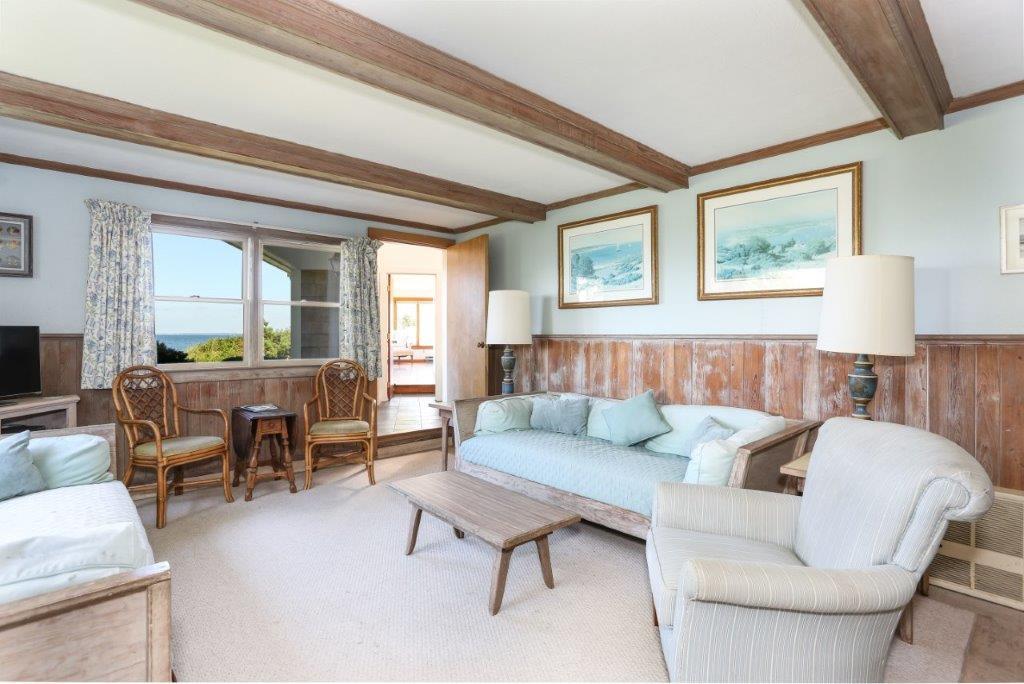 114 Quaker Road Falmouth, MA 02540 - Photo 7 of 35 a living room with furniture and a large window