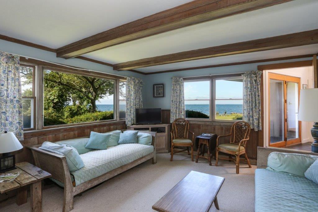 114 Quaker Road Falmouth, MA 02540 - Photo 8 of 35 a living room with furniture and a window