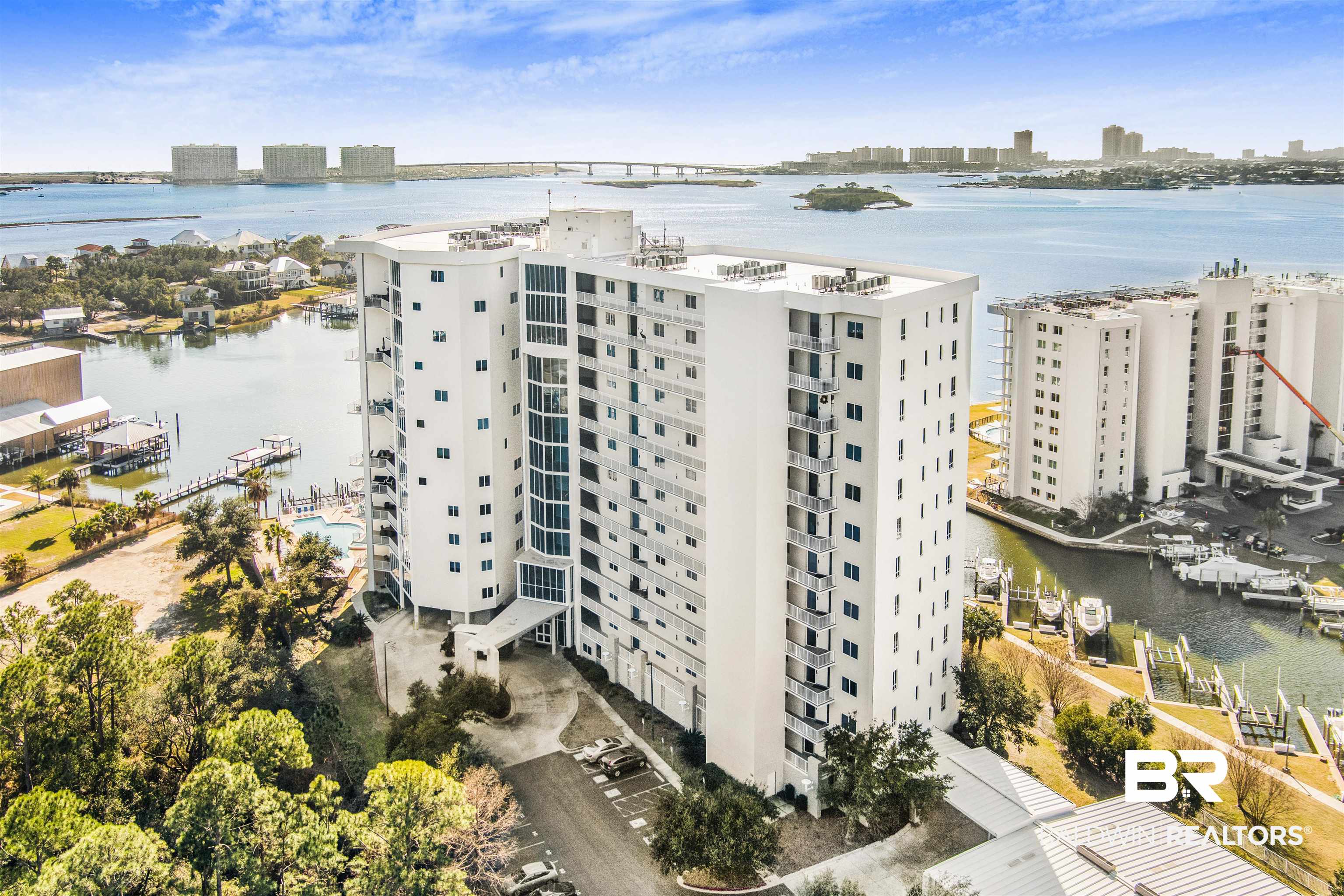 28250 Canal Road, Unit 106 Orange Beach, AL 36561 - Photo 40 of 50 View of apartment building / complex with a water view and a city view