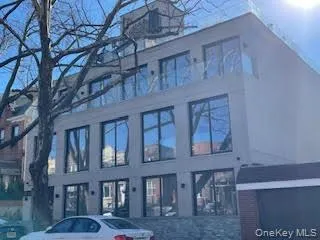 a front view of a building with balcony