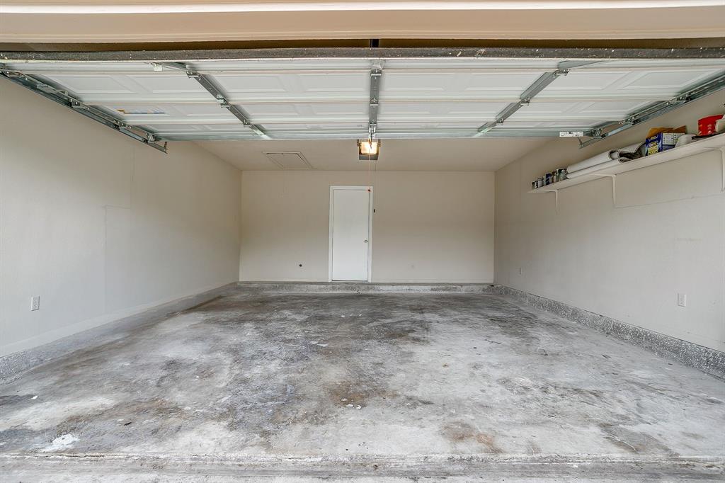 8613 Silver Creek Road White Settlement, TX 76108 - Photo 28 of 40 a view of a room with racks on the wall