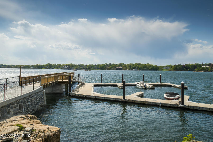 10 Highgate Road Riverside, CT 06878 - Photo 1 of 2 a view of a lake with sitting area