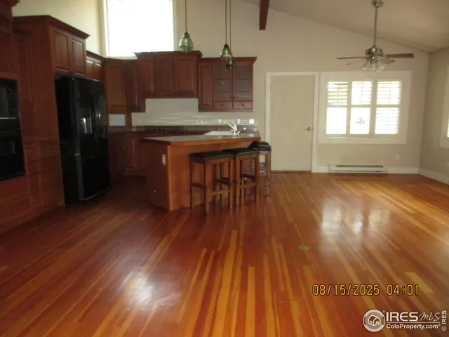 a view of a backyard of the house