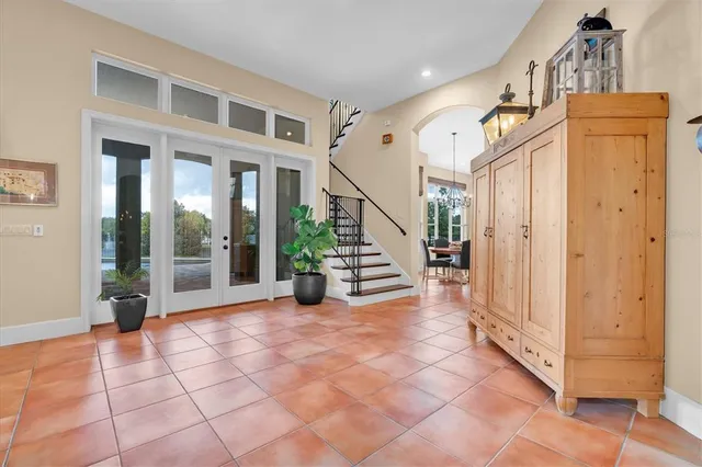 a kitchen with granite countertop a stove and a sink