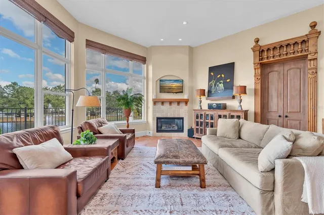 a dining room with furniture and chandelier kitchen view