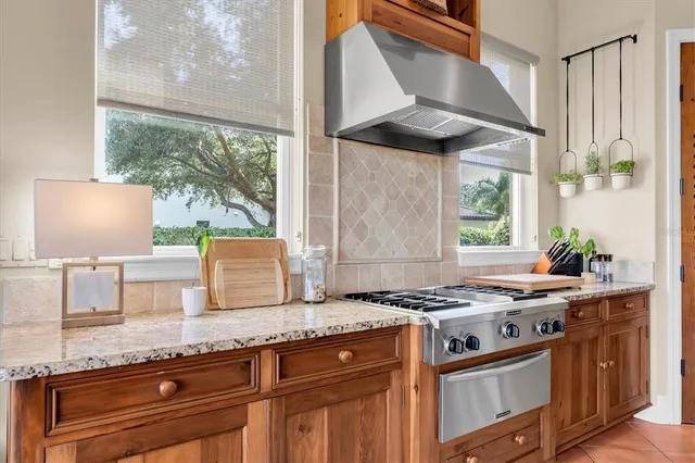 a bathroom with a toilet a sink and a mirror