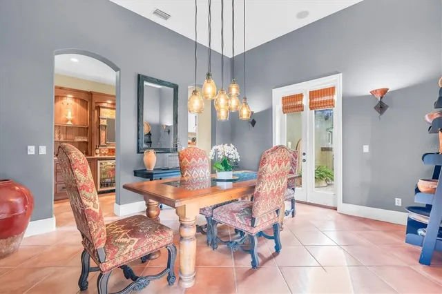 a bathroom with a granite countertop shower and a sink