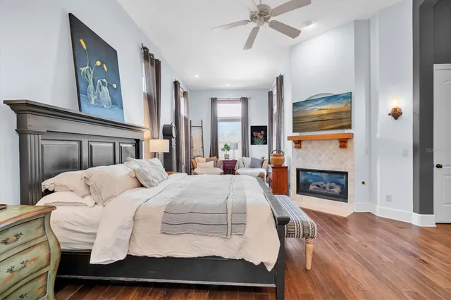 a view of a lake with houses in the back