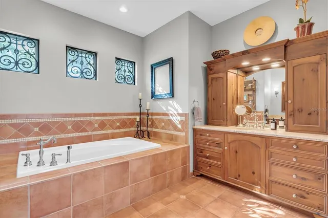 an aerial view of house with yard swimming pool and outdoor seating