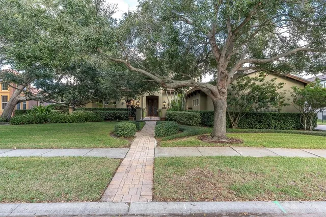 a view of a hallway with windows and entryway
