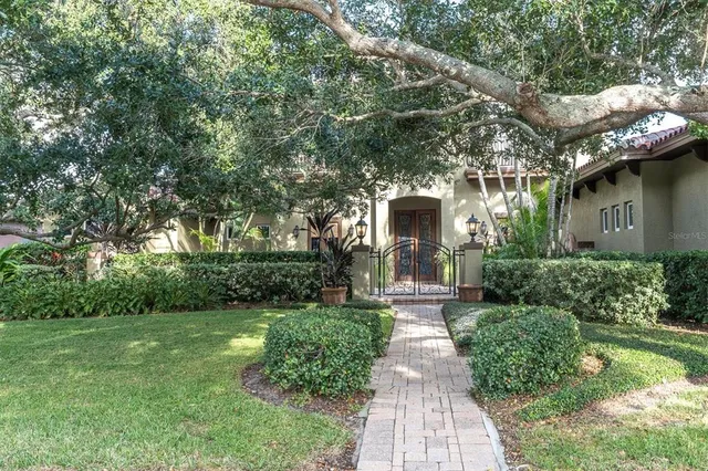 a view of entryway livingroom and hall with wooden floor