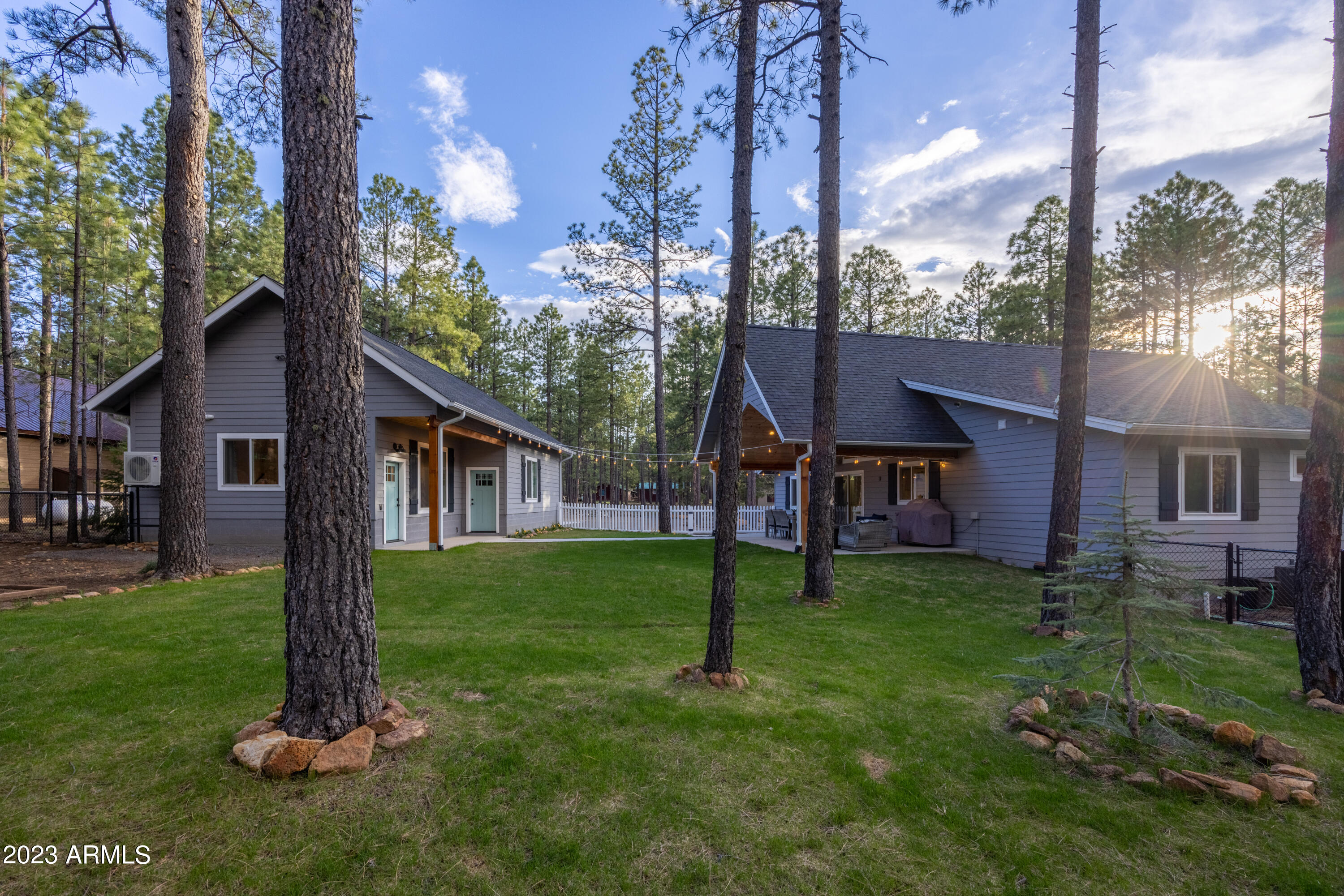 2772 Larson Loop Forest Lakes, AZ 85931 - Photo 41 of 65 a front view of a house with a garden