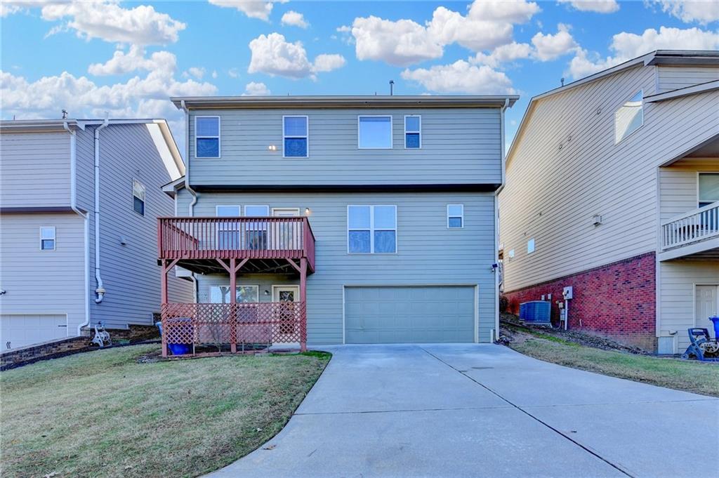 3670 Baxley Ridge Drive Suwanee, GA 30024 - Photo 61 of 64 a view of a house with a yard