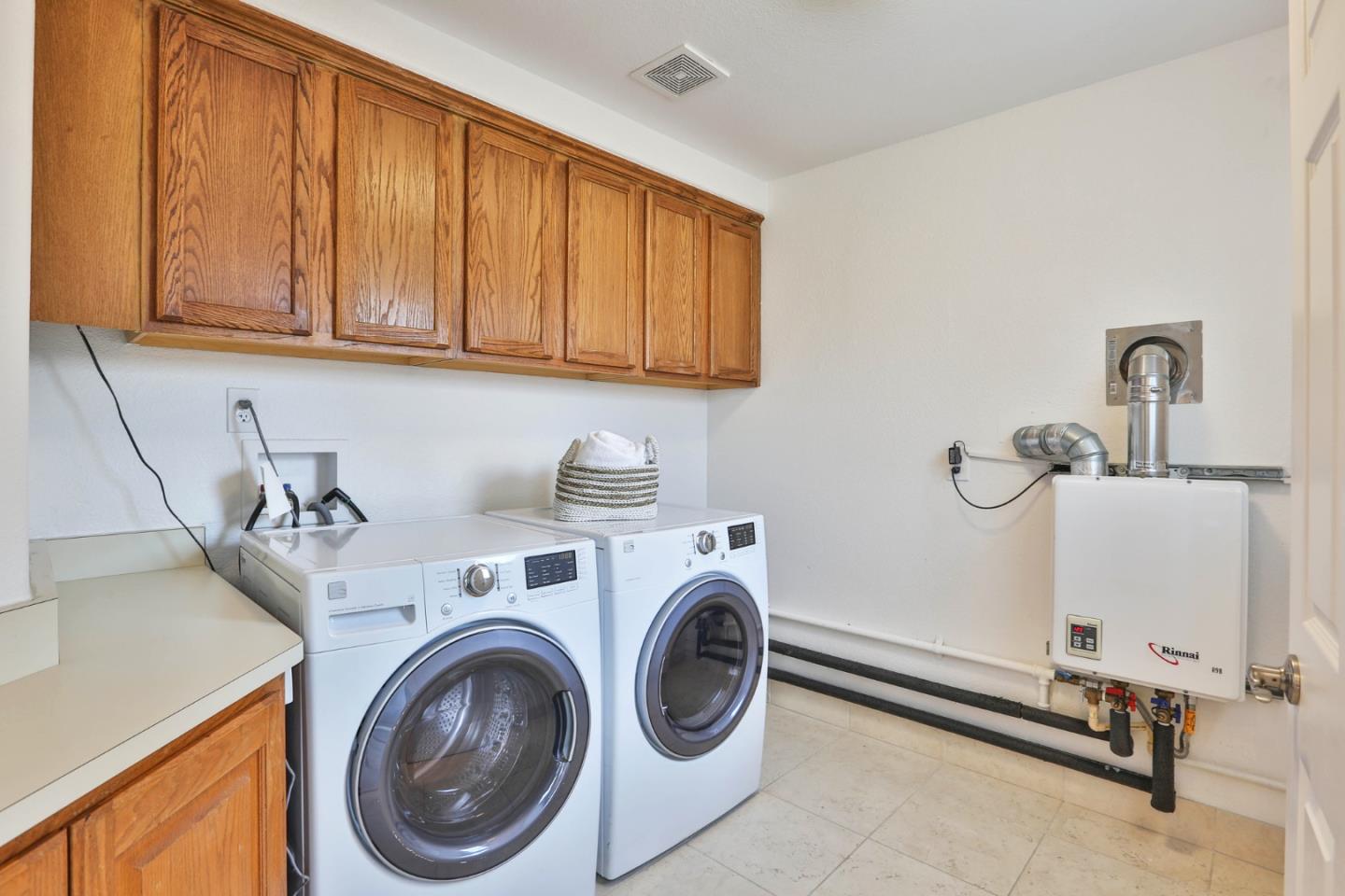 22344 McClellan Road Cupertino, CA 95014 - Photo 15 of 42 a utility room with sink dryer and washer