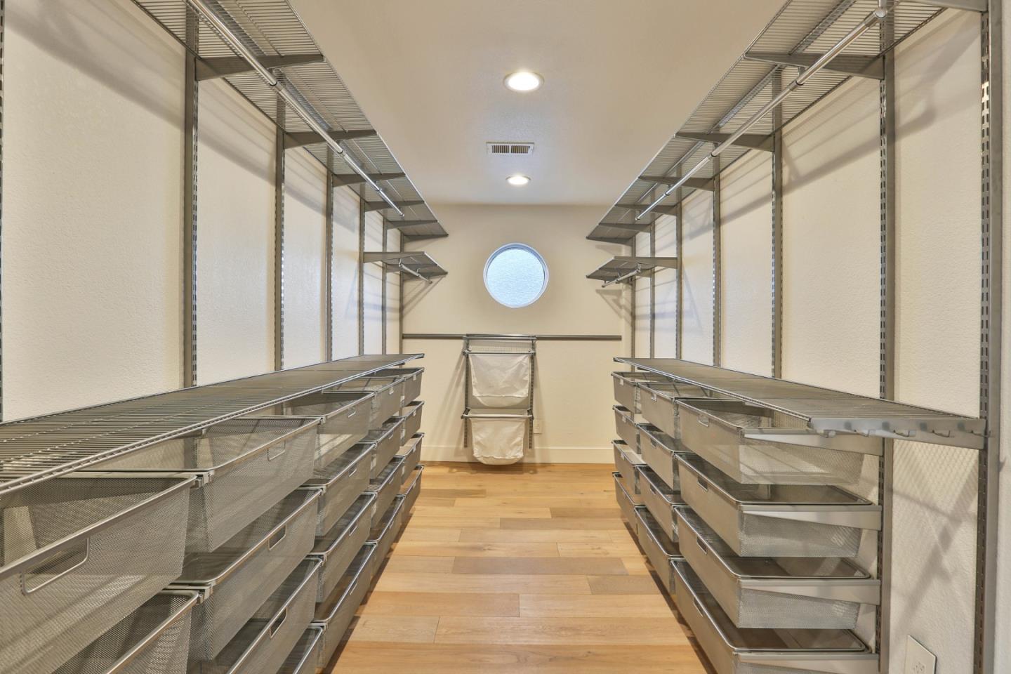 22344 McClellan Road Cupertino, CA 95014 - Photo 30 of 42 a view of a walk in closet