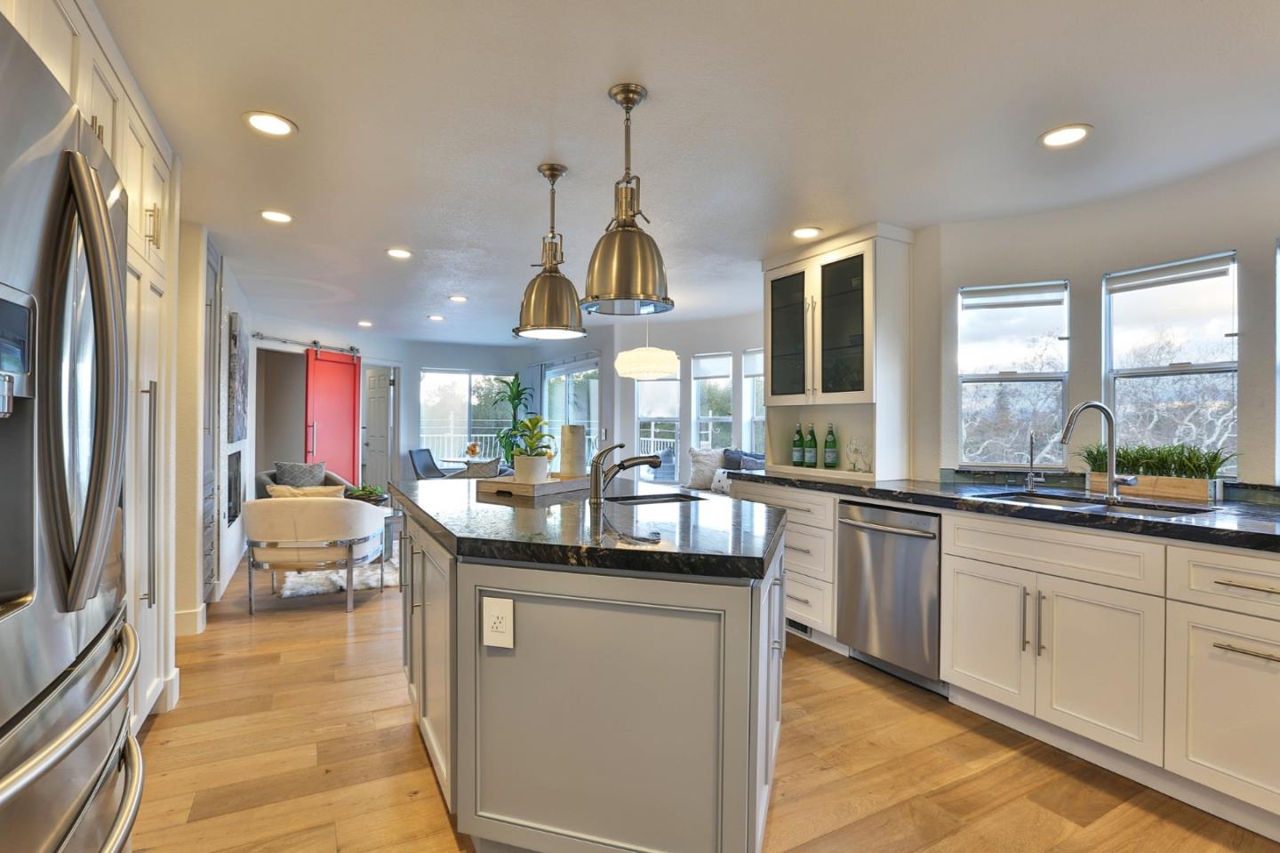 22344 McClellan Road Cupertino, CA 95014 - Photo 3 of 42 a kitchen with counter top space sink and living room