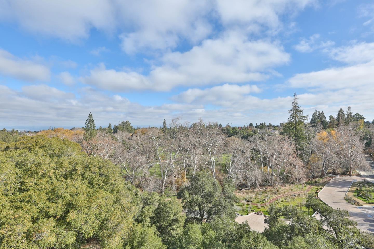 22344 McClellan Road Cupertino, CA 95014 - Photo 38 of 42 a view of a city and mountains in the background