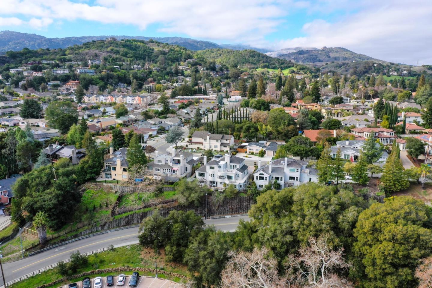 22344 McClellan Road Cupertino, CA 95014 - Photo 40 of 42 an aerial view of a city with lots of residential buildings
