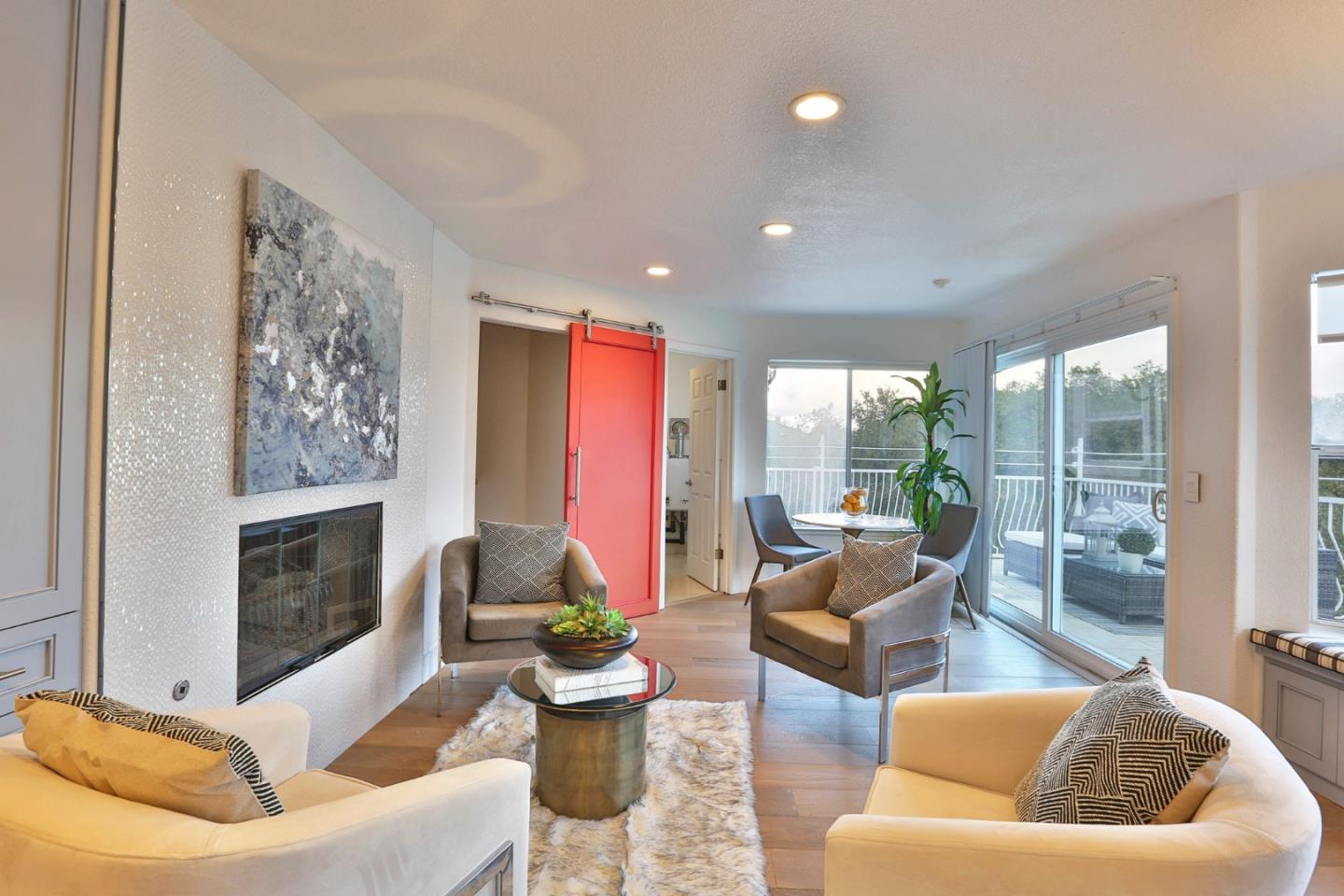 22344 McClellan Road Cupertino, CA 95014 - Photo 6 of 42 a living room with furniture and a fireplace