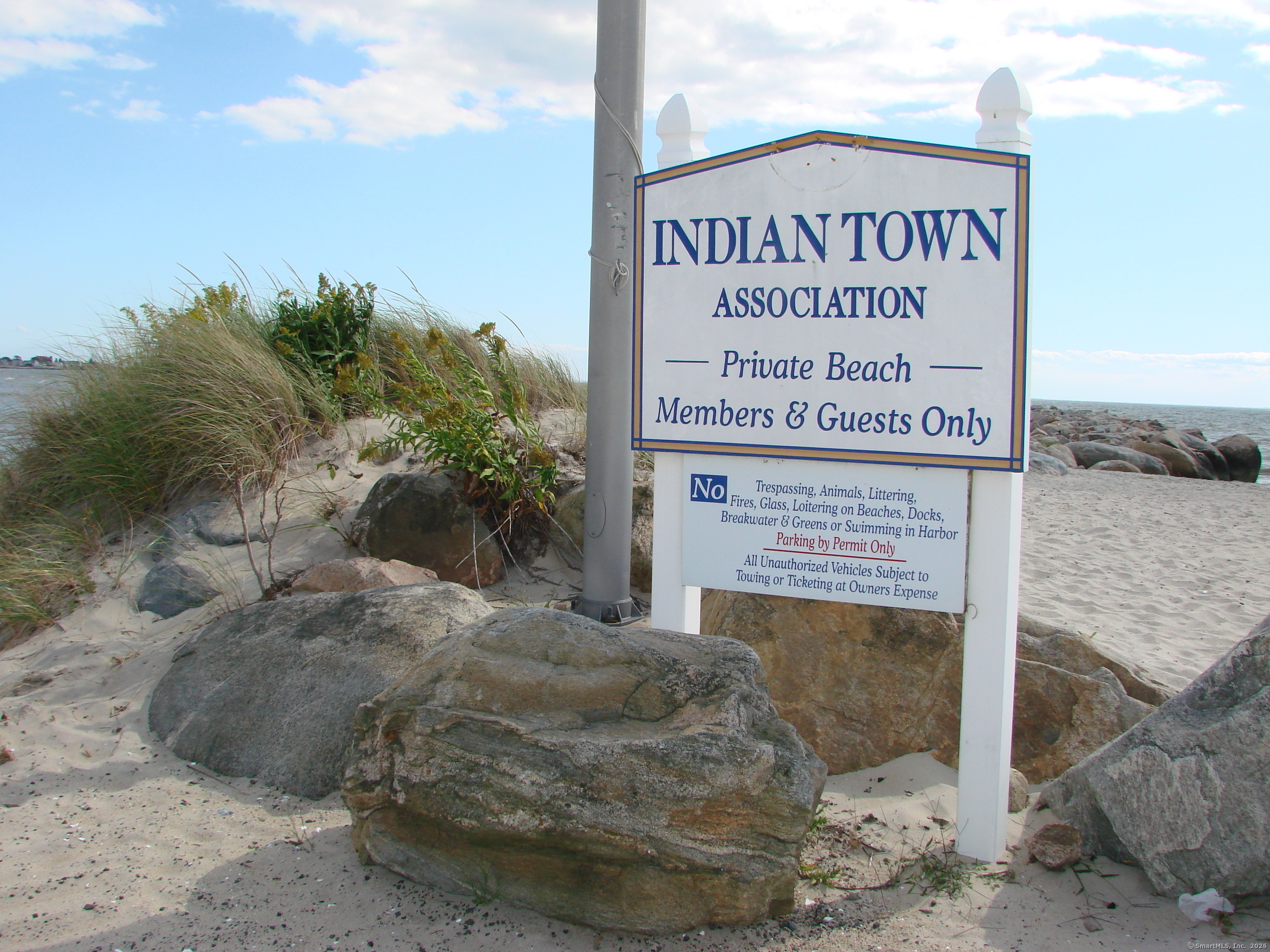 a sign on the side of the road