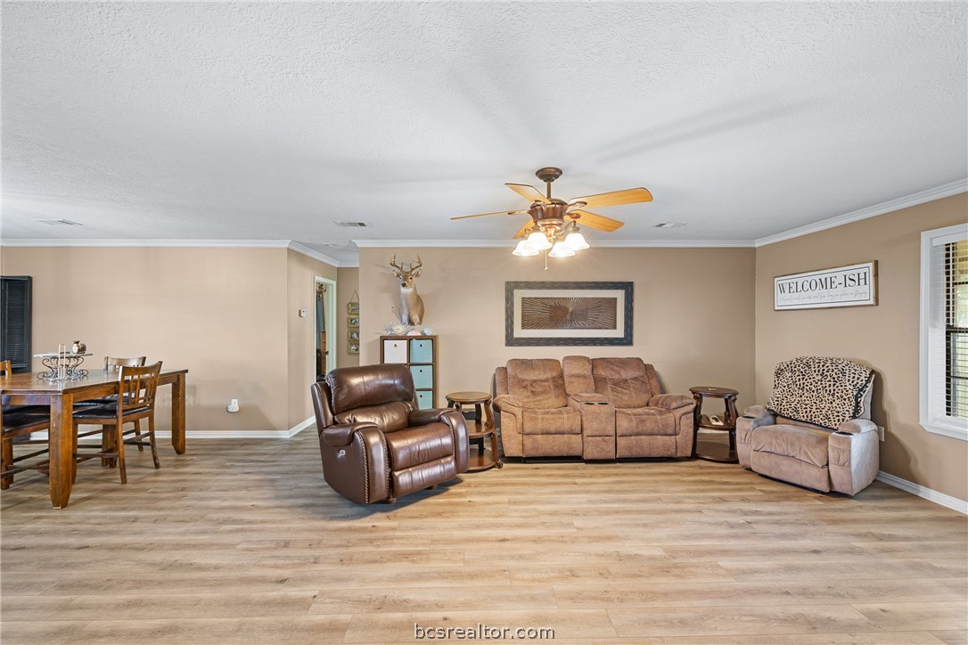 3540 Fisher Ranch Road Bryan, TX 77808 - Photo 6 of 36 a bedroom with furniture and wooden floor