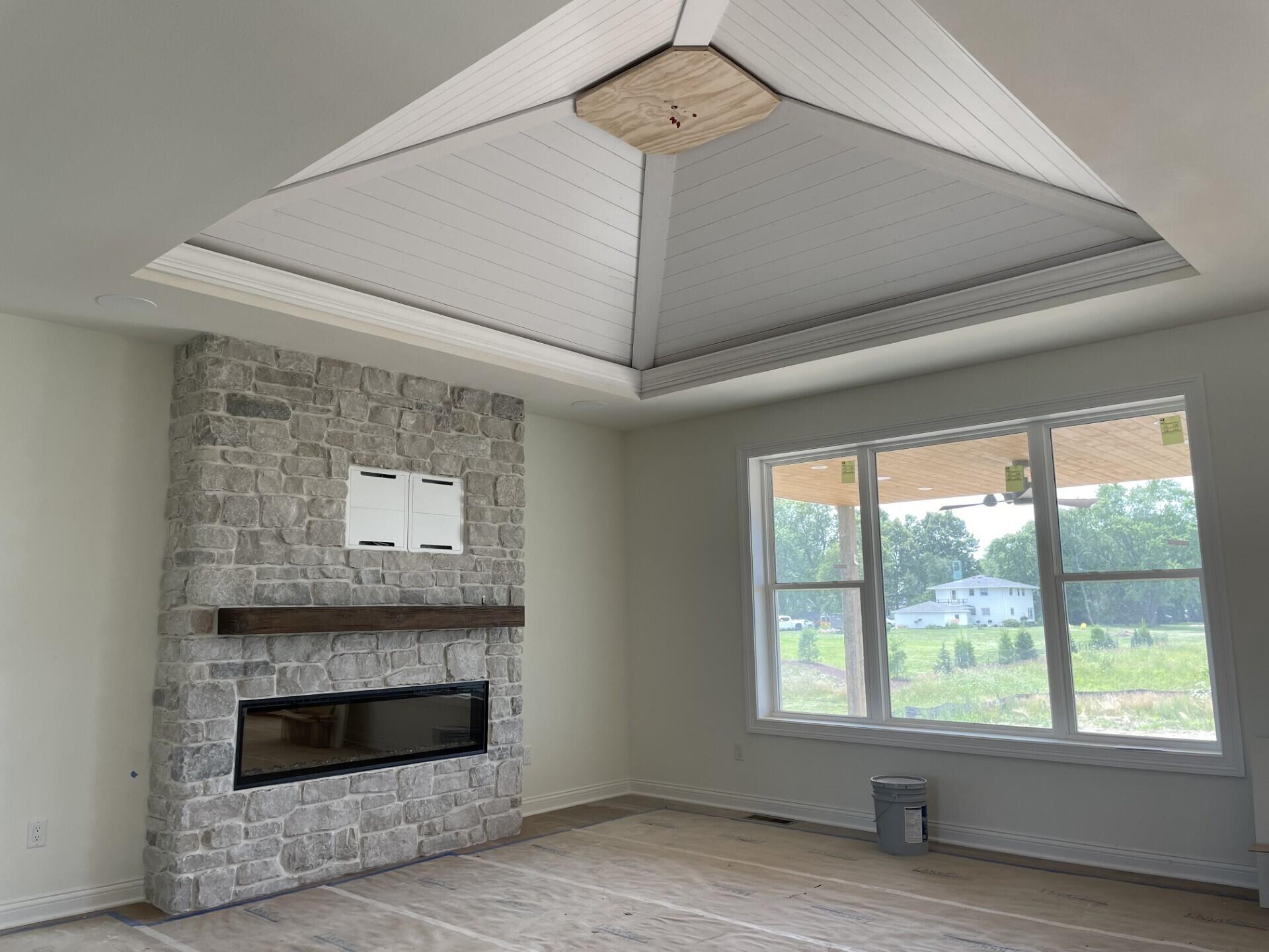 W358-n6309 W358-n6309 Ennis Road Oconomowoc, WI 53066 - Photo 8 of 47 Great Room Ceiling w/ Wood Detail