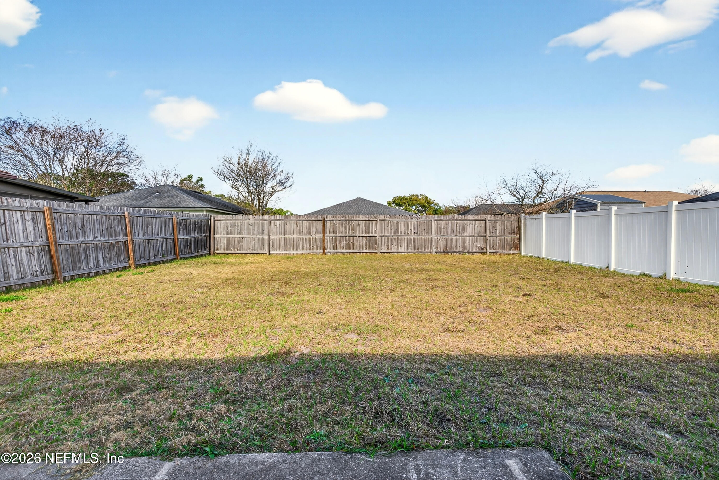 8745 Buzz Court Jacksonville, FL 32216 - Photo 23 of 23 a swimming pool with an outdoor space and seating
