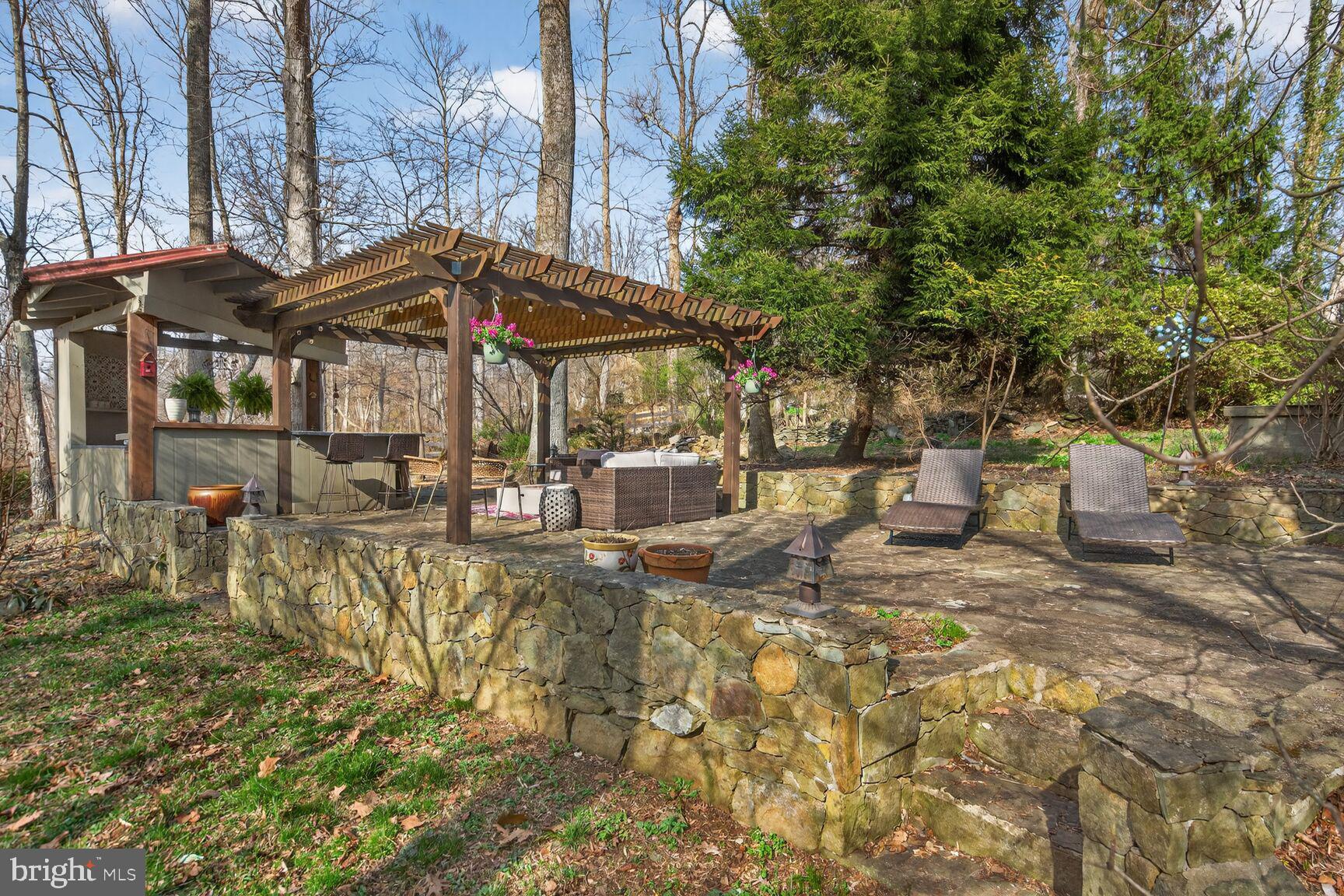 17641 Raven Rocks Road Bluemont, VA 20135 - Photo 69 of 109 Stone Walls and Built-in Lighting around the Patio