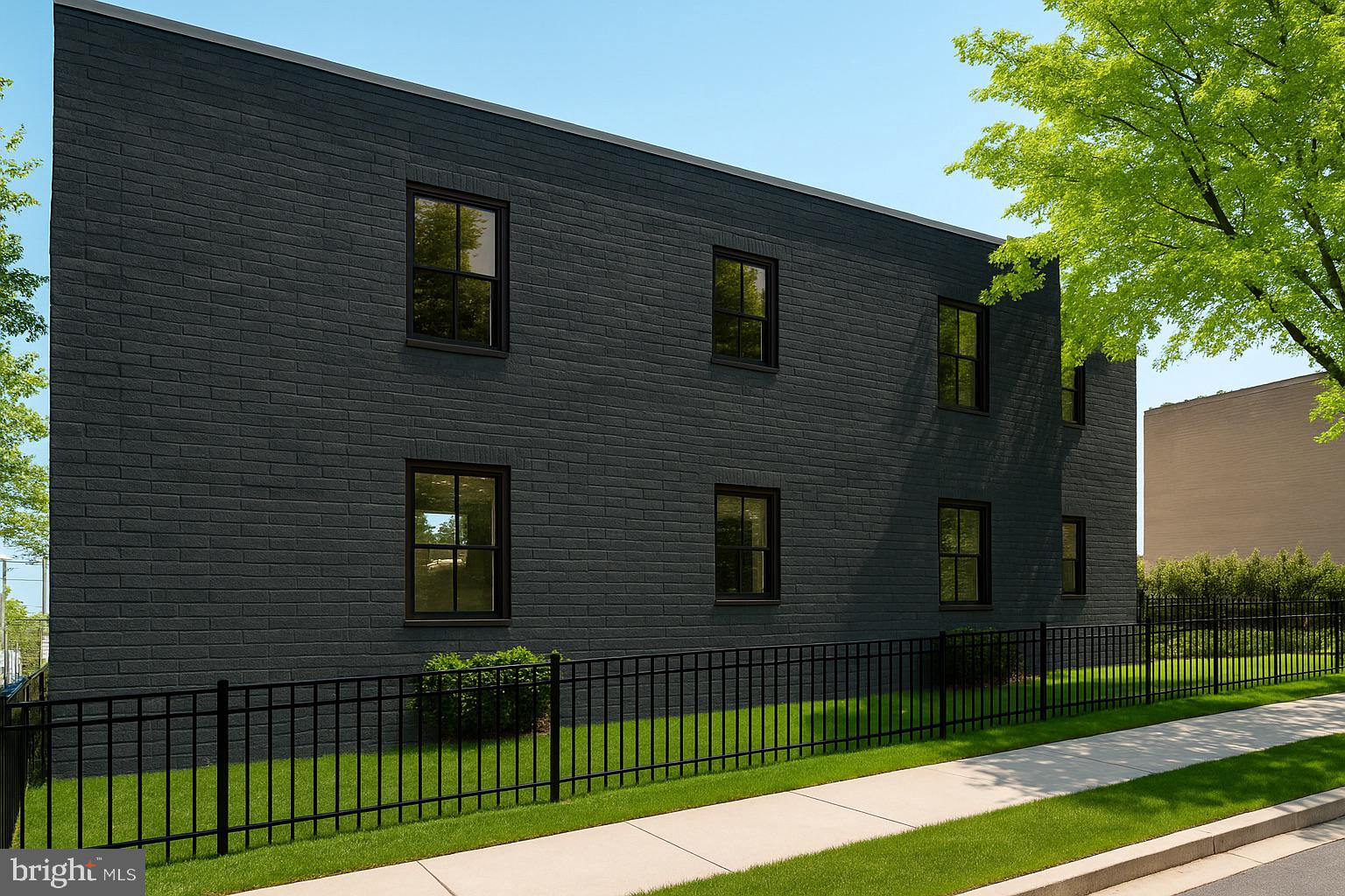 1721 Q Street Southeast Washington, DC 20020 - Photo 2 of 7 a front view of a house with a garden