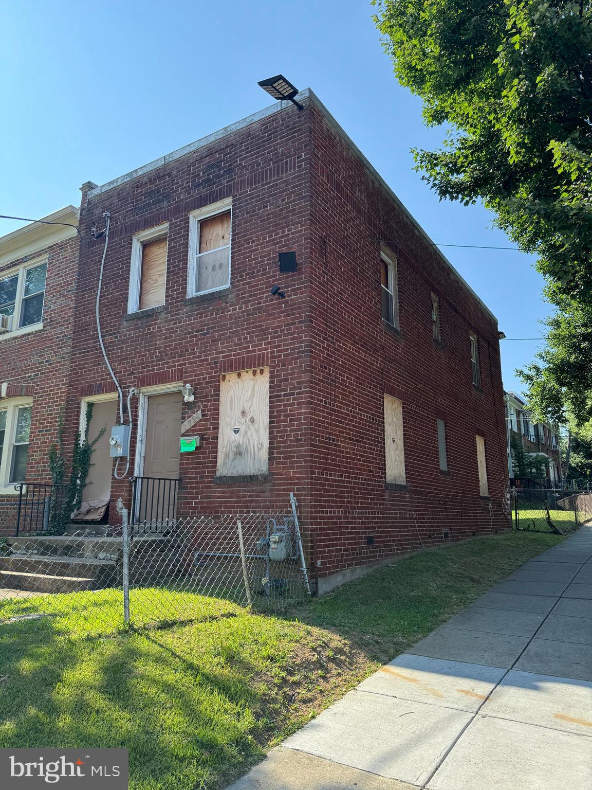 1721 Q Street Southeast Washington, DC 20020 - Photo 6 of 7 a backyard of a house with yard and patio