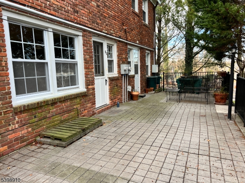 15 Norwood Avenue, Unit B2 Summit, NJ 07901 - Photo 15 of 18 a view of a house with backyard and sitting area
