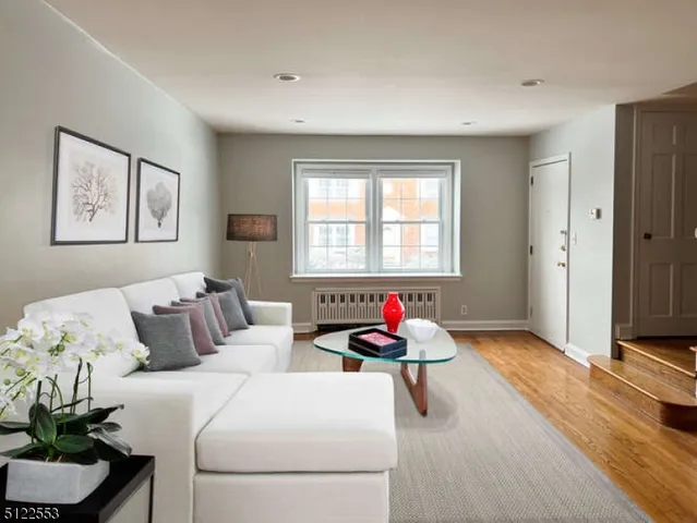 a bedroom with bed and a window