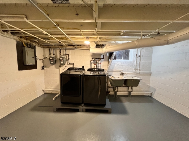 15 Norwood Avenue, Unit B2 Summit, NJ 07901 - Photo 10 of 18 a room with storage and utility