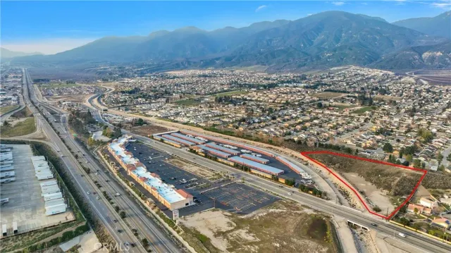 a view of a building with a mountain
