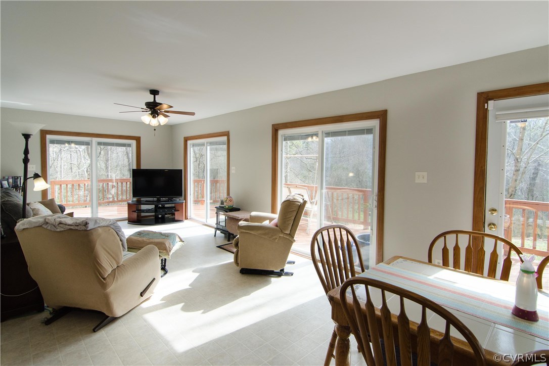 7720 Old Beach Road Chesterfield, VA 23838 - Photo 5 of 19 a living room with furniture a flat screen tv and large window